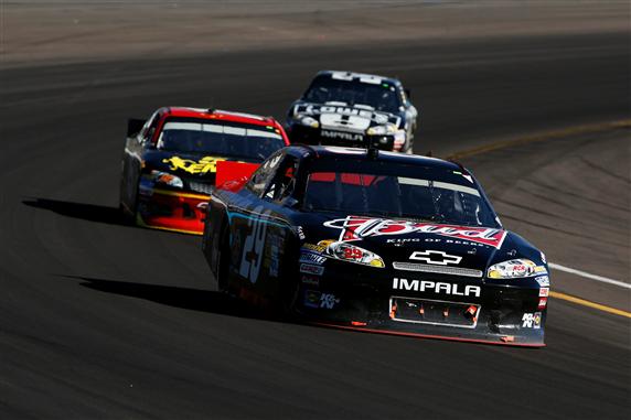 NASCAR Sprint Cup 2012 - Page 2 2012 Phoenix2 Kevin Harvick Leads Clint Bowyer And Jimmie Johnson